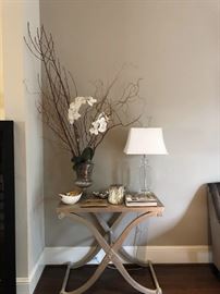 Beautiful modern side table with "X" shaped legs and antique gold finish. Accessories are also for sale. 