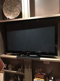 tv, books, and home decor