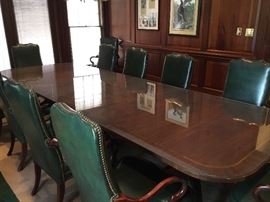 Councill Craftsman 12’ Gorgeous Inlaid Table with Pedastal Legs. This includes a 4’ removeable Leaf. The table has been protected with a custom cut single sheet of glass. $3000
