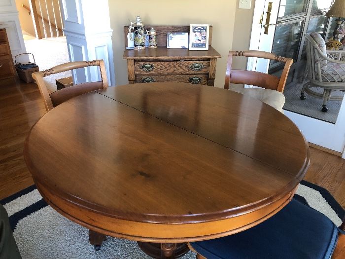Round table kitchen table with four chairs.  44 inches round 