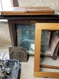 Lots of frames, glass, parts and pieces..