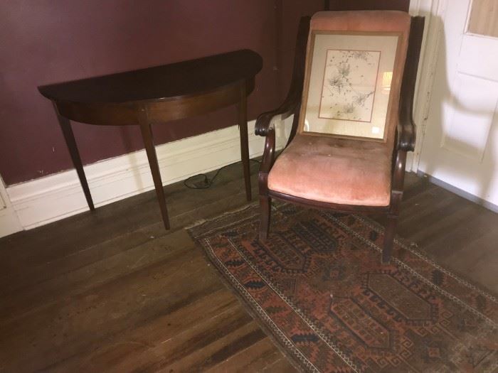 The second demilune table and a Victorian upholstered chair