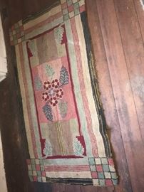 Charming much loved hand hooked rug