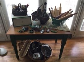 For your vintage kitchen - enamelware, rolling pins, baskets and the cutest farm-style table