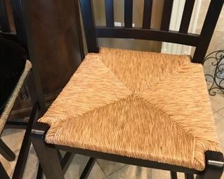 Pair of wooden bar chairs with woven rush seats