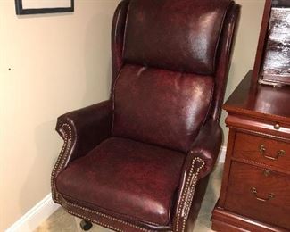BROWN LEATHER STUDDED OFFICE CHAIR