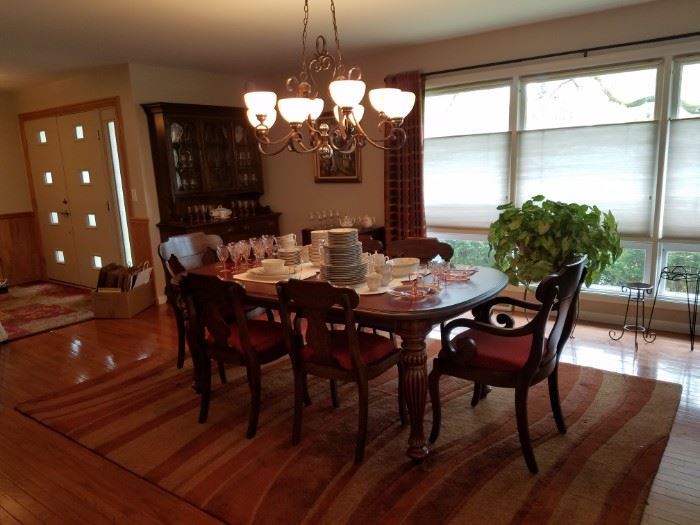 one of two dining sets, rug is also for sale