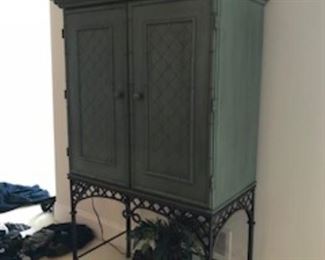 Cabinet on Metal Stand.