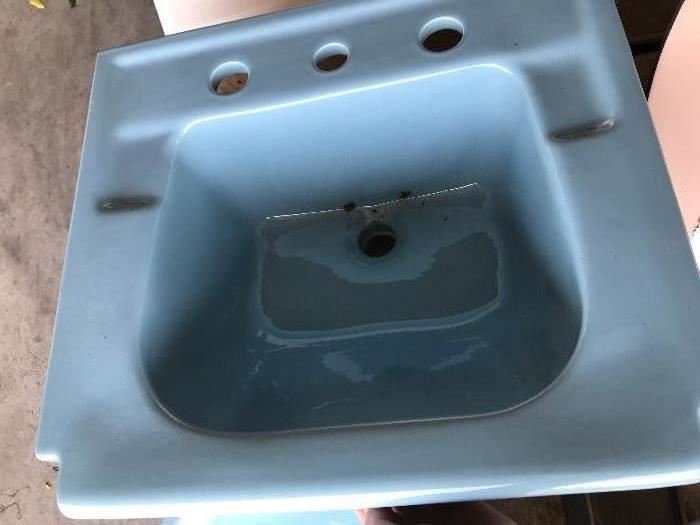 Powder blue old style bathroom sink. Give your home that mid century modern appeal.