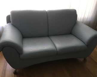 light blue leather love seat