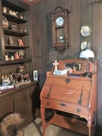 Slant top desk, Howard Miller wall clock, table lamp, collectibles, decor 