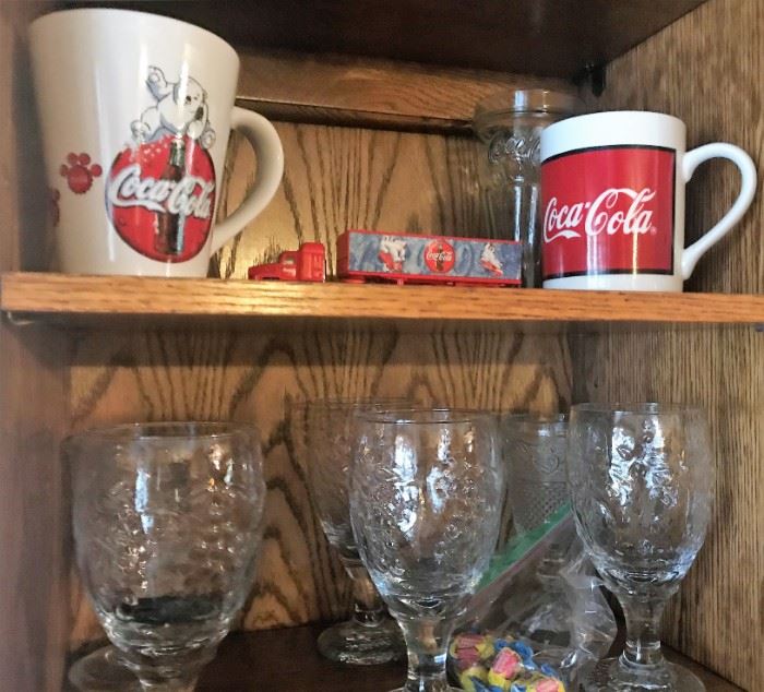Coca Cola mugs, truck, and glassware