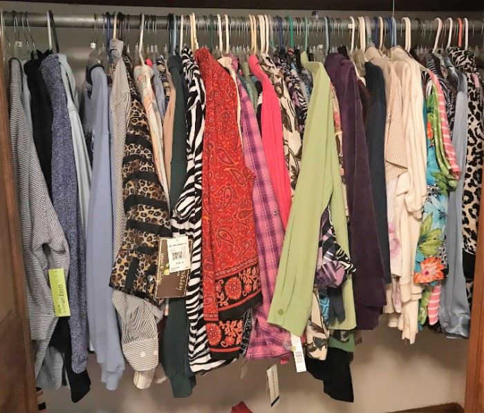 One of several full closets w/new tags on most clothes
