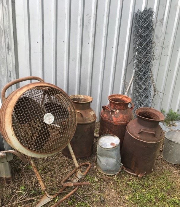 Vintage milk cans, fan, fencing