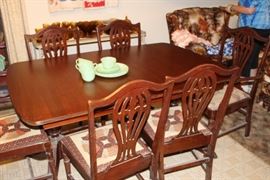 matching dining table and six chairs