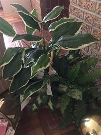 Several Artificial Plants In Pots