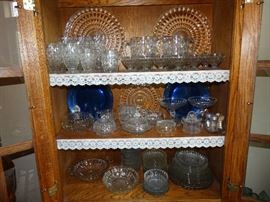 Blue depression glass. oak china cabinet