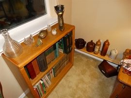 small oak open bookcase, figural nut cracker, pottery, crocks, collectibles