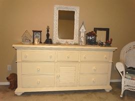 pretty dresser, wicker mirror