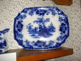 Flow blue platter in the rare "Scinde" pattern