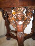 Detail on carved table in living room