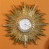 Syroco Wood "sunburst" clock with key-wound movement