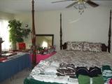 Henredon tester bed (mahogany); holiday ornaments; linens; much more (master bedroom)