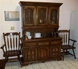 Kincaid dark oak china cabinet and two captain's chairs