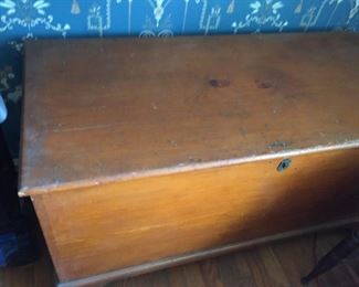 Nice small wooden trunk.