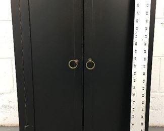 Black stand with 2 doors and shelf