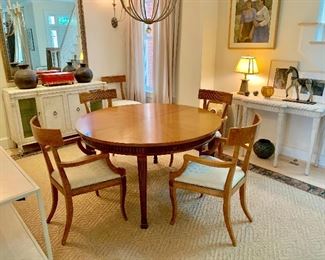Niermann Weeks Georgian round dining table with two leaves.  Burl wood armchairs.  Mirror and chandelier not for sale