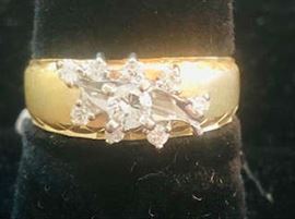 14K Gold Diamond ring . 1/2 Ct. total diamond weight size 7 weighs 4.6 grams