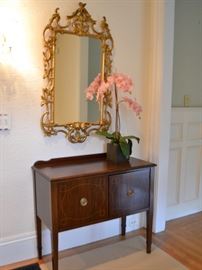 Gilt mirror and cabinet with inlay