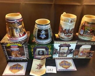 4 various Budweiser steins