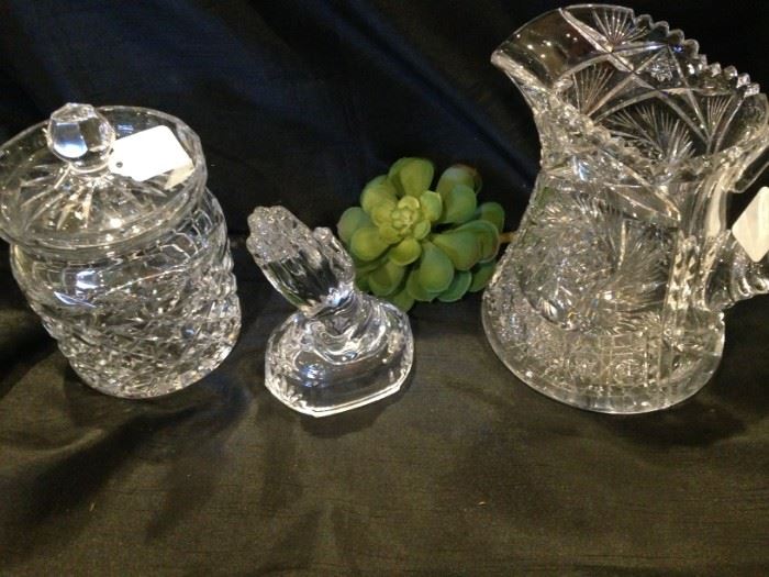 Crystal biscuit barrel, praying hands, and serving pitcher 