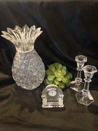 Crystal pineapple (sign of hospitality), clock, and candle holders  