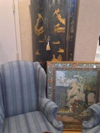 Pair of matching blue wingback chairs; framed art  