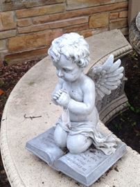 Praying angel statue