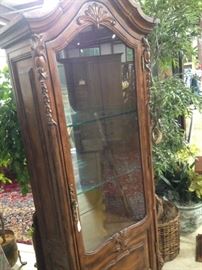 Glass front curio cabinet
