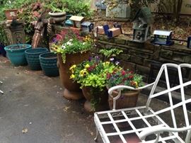 White patio bench and some of the many planters and birdhouses (Remember .  .   .  we open at 7 :00 AM Tuesday, April 30th at 2512 Alta Mira Drive - Tyler, TX 75701)