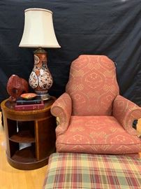 Another great lamp; round 3- level side table; good-looking upholstered chair and ottoman  