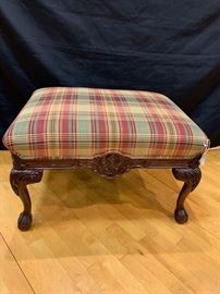 Plaid upholstered ottoman  
