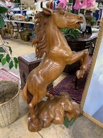 Carved mustang statue