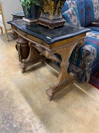 A smaller marble top side/sofa table --- beautiful carving