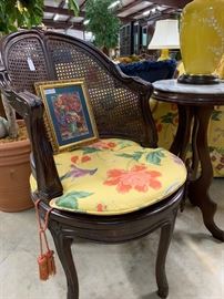 The cushion matches the charming cane back chair. 