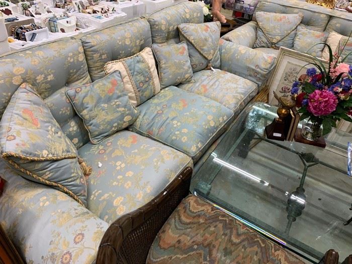 Lucious silk sofa and custom pillows; glass top coffee table