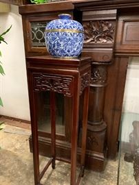 Asian style plant stand;  refined detailing on the mantel 