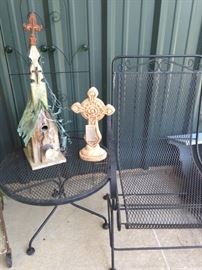 Patio chair and small table; cross and bird house