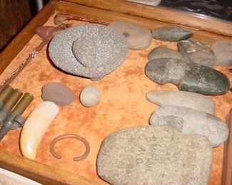 This is a closeup of the largest collection of authentic early American Indian artifacts we've ever had at any sale. As I stated in writeup this man's grandfather was an avid collector and spent many hours digging, searching, and communicating with others, as he transversed the Country in his Government job with Education department in the 30's & 40's . ALL of this collection was packed up in 1952 when he moved last time, and never unpacked until this past week. The there are 100's of arrowheads, many of the axe, hatchet, and working tools, plus beads, and other items.