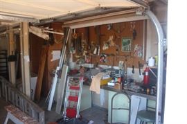 Garage- Large selection of tools and hardware, 1 12' aluminum step ladder, 40' extention ladder, 2 8' step ladders (1 wood and 1 aluminum)